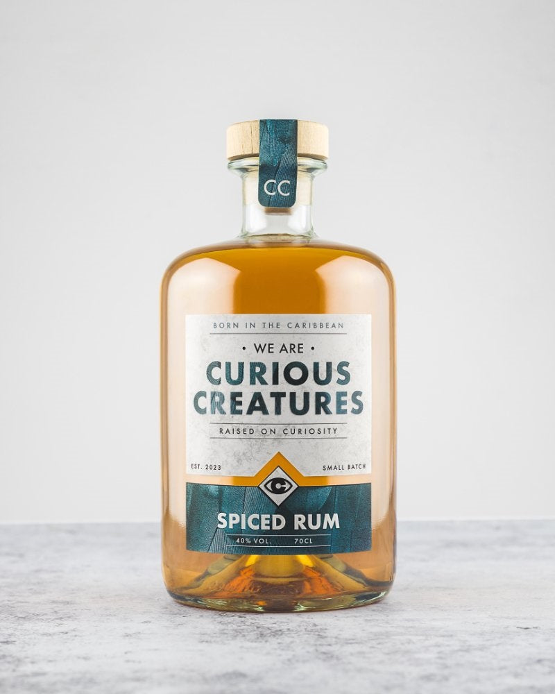 PICED RUM 40%  WE ARE CURIOUS CREATURES, BRISTOL  BORN IN THE CARIBBEAN AND RAISED ON CURIOSITY